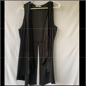 Long vest slit in back w/ties
